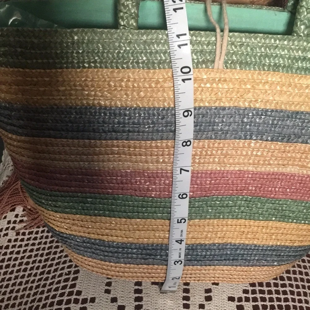 Natural straw bag in green blue, red colors